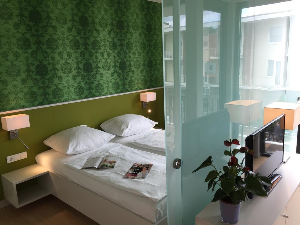 Carat Apartments Grömitz Habitación foto